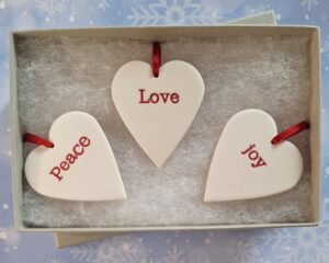 Alternative view of Set of 3 Hearts - Peace, Love, Joy - Red Glaze
